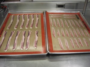 house made bacon ready to be candied and guanciale about to be dehydrated